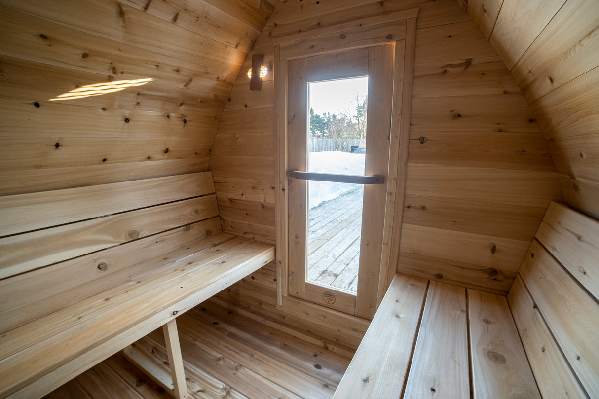 Experience the luxury of Dundalk Leisurecraft 4-Person Canadian Timber Minipod Sauna - a peaceful retreat for relaxation and rejuvenation.