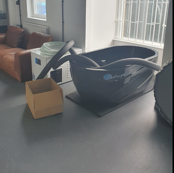 Discover the luxurious Dream Pod Fiberglass Ice Bath with Chiller at Aurora Sanctuary - ideal for relaxation and rejuvenation