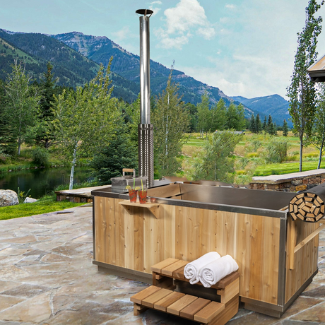 Canadian Timber Wood-Burning Hot Tub with Roll-Up Cover Kit - Relaxing outdoor spa experience with natural wood design at Aurora Sanctuary.