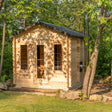 Georgian style Canadian Timber Sauna with Changer by Dundalk Leisurecraft, ideal for luxurious relaxation and unwinding in a cozy wooden cabin setting