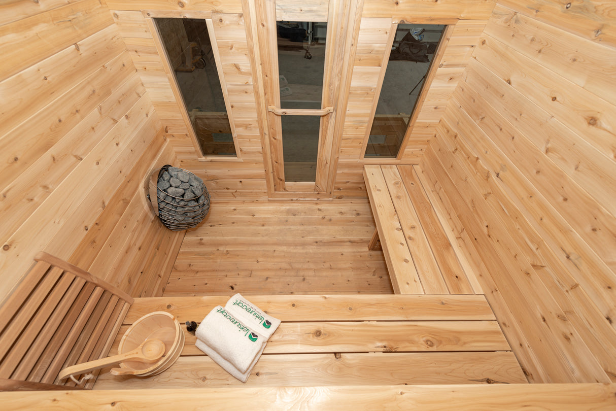 Experience the luxury of a Dundalk Leisurecraft Canadian Timber 6-Person Georgian Cabin Sauna - perfect for relaxation and rejuvenation at home.